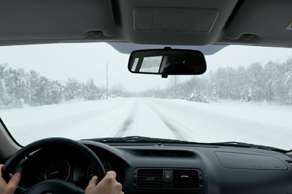 driving in a snowy day image