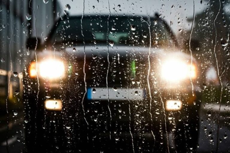 glaring car light at rain